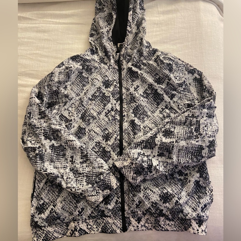 PINK wind breaker.  Zipper front. Blk/white snakeskin like pattern. M/L